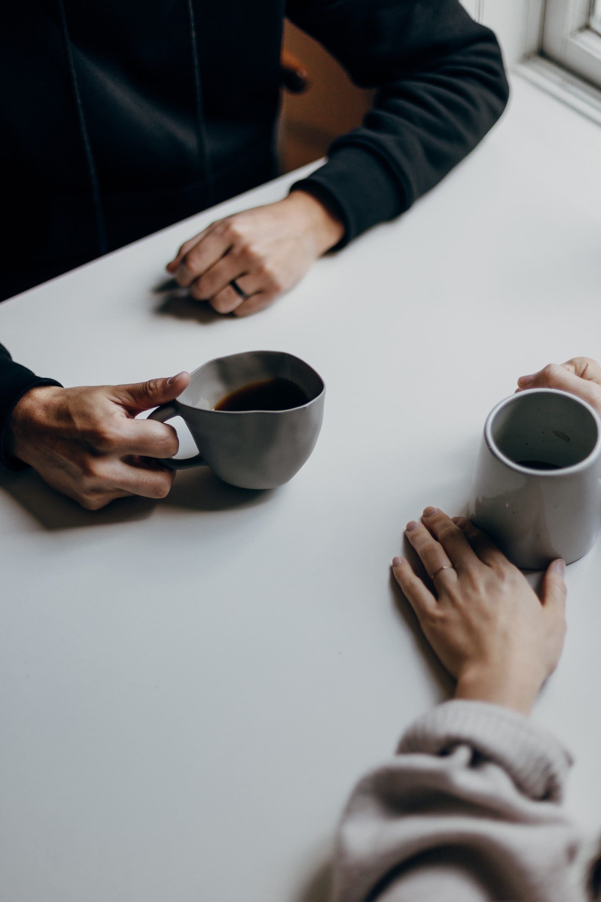 People having coffee together.